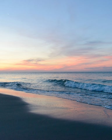 Soft pink and blue sunrise over the Atlantic Ocean at Myrtle Beach